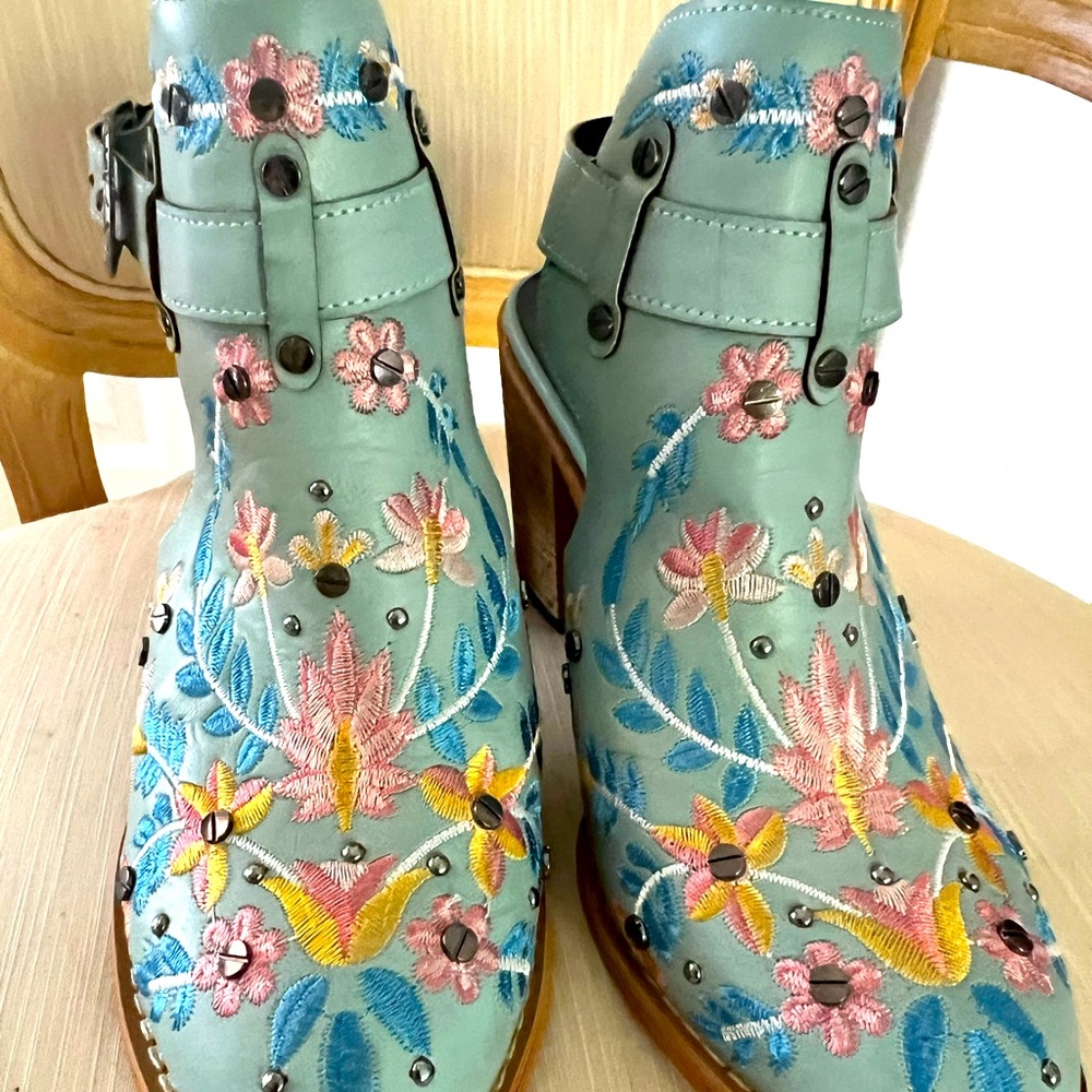 Blue embroidered shoes.